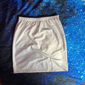 White skirt, originally bought from Rainbow. It is a size small.
